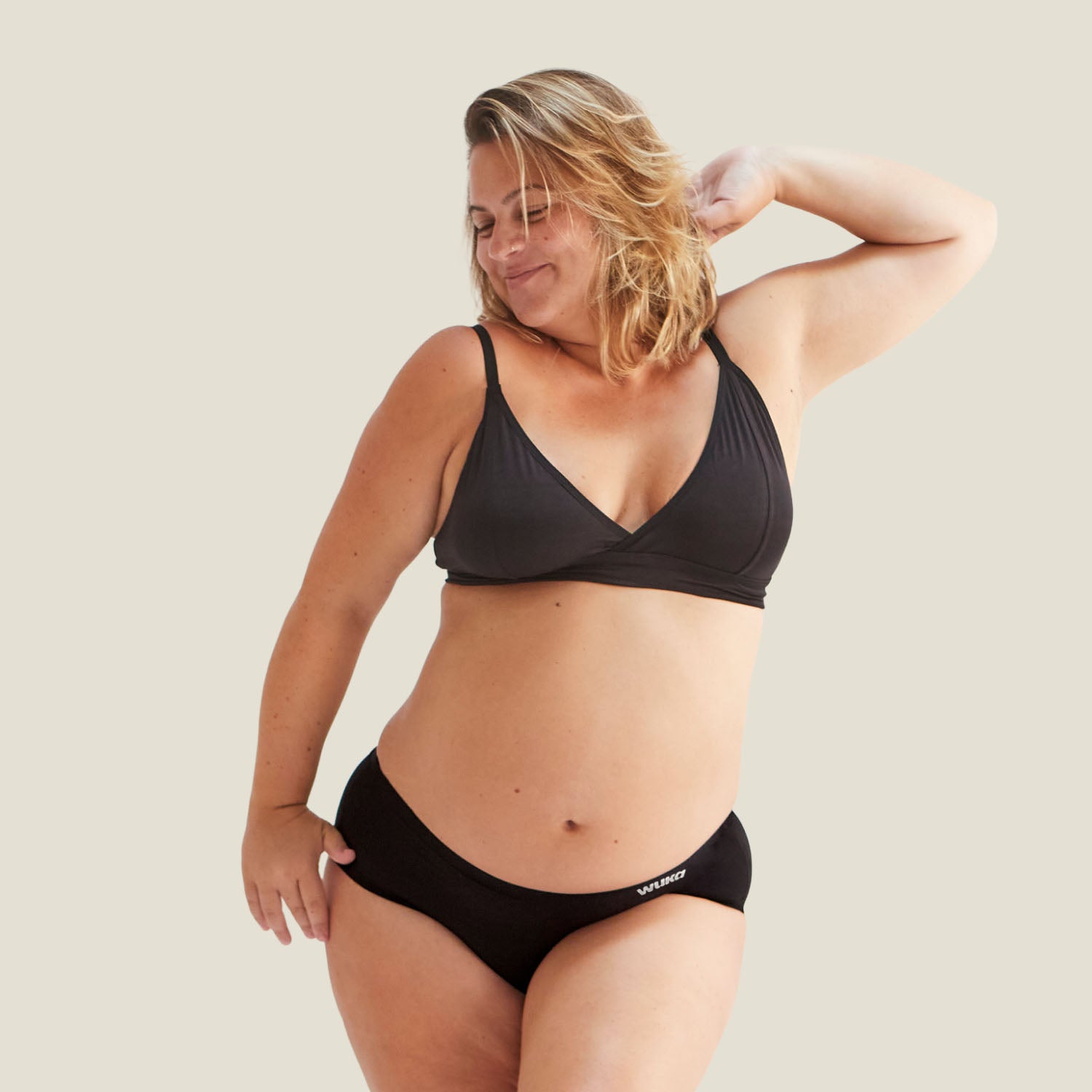 Model wearing WUKA Stretch™ High Waist Postpartum Period Pants, showcasing full coverage and flexible support for postpartum recovery.