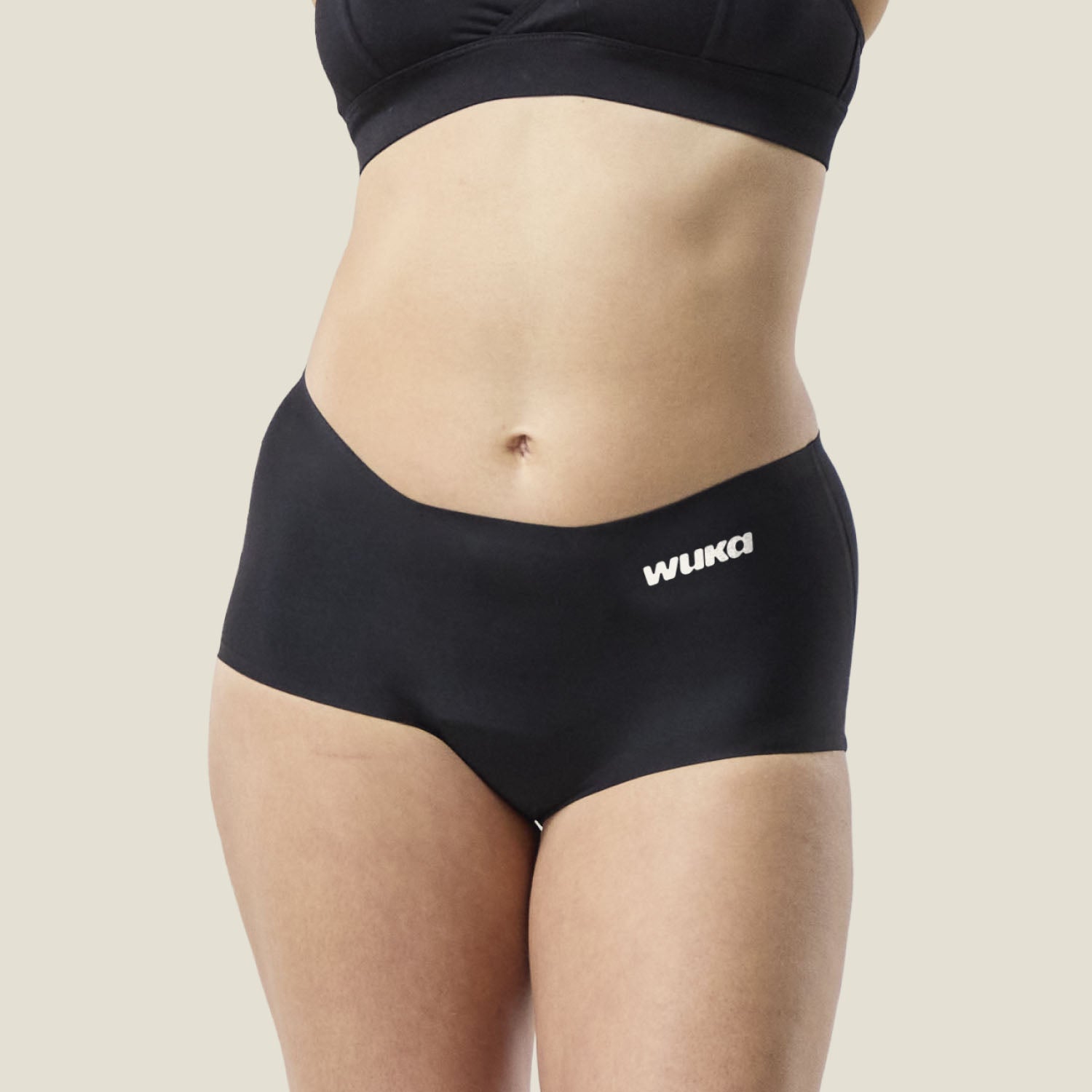 Front view of WUKA Teen Stretch™ Boxer in black, designed for heavy flow period protection with ultra-soft stretch fabric.