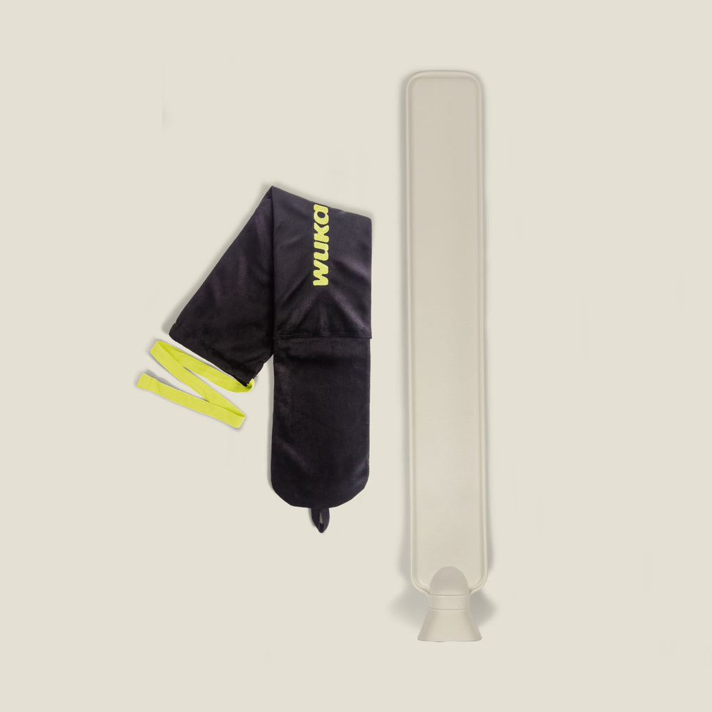 WUKA’s long hot water bottle shown alongside removable insert, highlighting full product length and tie-fastening design