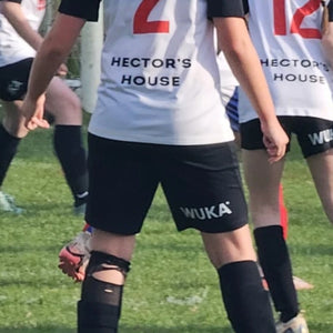 Young female footballers wearing WUKA period wear during training, highlighting club testimonials on removing period barriers in sport